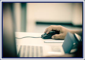 Student uses a computer mouse